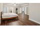 Large main bedroom features hardwood floors, tray ceiling, and multiple closets at 1867 Castleberry Ln, Buford, GA 30518