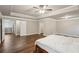 Expansive main bedroom features hardwood floors, tray ceiling, and multiple closets at 1867 Castleberry Ln, Buford, GA 30518
