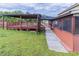Extensive backyard showcasing a covered deck and a screened-in porch at 204 Saintvry Path, Atlanta, GA 30349