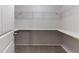 Walk-in closet featuring wire racks and shelves for storage at 204 Saintvry Path, Atlanta, GA 30349