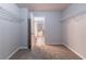 Walk-in closet featuring wire racks and shelves with a door to the bathroom at 204 Saintvry Path, Atlanta, GA 30349