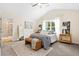 This bedroom features large windows, a ceiling fan, and neutral decor at 213 Starr Cir, Stockbridge, GA 30281