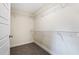 This bare walk-in closet with wire shelving offers ample storage space at 213 Starr Cir, Stockbridge, GA 30281