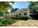 Beautiful backyard view of a two story home with a covered porch and nicely landscaped yard at 3265 Bethesda Park Ct, Lawrenceville, GA 30044