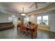 Bright dining room with tile floors, with multiple windows allowing for lots of natural light at 3265 Bethesda Park Ct, Lawrenceville, GA 30044