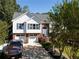Charming two-story home with a well-manicured front yard and two-car garage at 3265 Bethesda Park Ct, Lawrenceville, GA 30044
