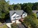 Charming two-story home with a well-manicured lawn, attached garage, and inviting front porch at 3265 Bethesda Park Ct, Lawrenceville, GA 30044