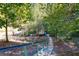 Picturesque gazebo nestled among trees, accessible by a concrete walkway at 3265 Bethesda Park Ct, Lawrenceville, GA 30044