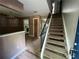 View of the home's entryway and staircase. The staircase leads up to the second floor of the home at 2572 Stratford Ln, Morrow, GA 30260