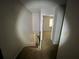 Image showing the hallway leading to another room with a window at 2572 Stratford Ln, Morrow, GA 30260