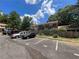 Exterior image of a parking lot with several cars in front of a brick home at 2572 Stratford Ln, Morrow, GA 30260