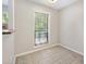 Bright breakfast nook with tile flooring and a large window providing natural light at 2814 Vinings Central Se Dr # 151, Atlanta, GA 30339