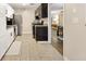 Functional kitchen with white cabinets, stainless steel appliances, and tile floors at 2814 Vinings Central Se Dr # 151, Atlanta, GA 30339
