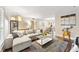 Open-concept living room with wood floors, a large sectional, and a view of the dining area at 2814 Vinings Central Se Dr # 151, Atlanta, GA 30339