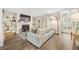 Comfortable living room with fireplace, built-ins, and hardwood flooring at 2814 Vinings Central Se Dr # 151, Atlanta, GA 30339