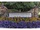 Attractive entrance sign for Vinings Central Condominiums surrounded by colorful landscaping at 2814 Vinings Central Se Dr # 151, Atlanta, GA 30339