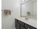 Bathroom featuring a vanity with sink and a framed mirror at 5035 Pattingham Dr, Roswell, GA 30075
