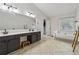 Spacious main bathroom featuring a soaking tub and double vanity at 5035 Pattingham Dr, Roswell, GA 30075