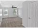 Spacious bedroom has neutral carpet, ceiling fan, and large windows for natural light at 1438 N Crossing Ne Dr, Atlanta, GA 30329
