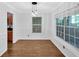 Dining room with hardwood floors and lots of light from the two large windows at 1438 N Crossing Ne Dr, Atlanta, GA 30329