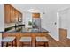 Kitchen with a breakfast bar, stainless steel appliances, and wood cabinetry at 1438 N Crossing Ne Dr, Atlanta, GA 30329