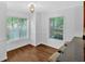 Bright kitchen breakfast nook with two windows and an island at 1438 N Crossing Ne Dr, Atlanta, GA 30329