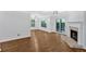 Spacious living room with a fireplace and sliding glass doors at 1438 N Crossing Ne Dr, Atlanta, GA 30329