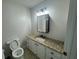 Bathroom featuring granite countertops and ample storage in the vanity and drawers at 2678 Stardust Trl, Decatur, GA 30034