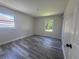 Cozy bedroom offers two windows for light and a closet for ample storage at 2678 Stardust Trl, Decatur, GA 30034
