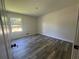 Cozy bedroom offers one window for light and a closet for ample storage at 2678 Stardust Trl, Decatur, GA 30034