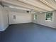 Spacious garage with painted floor, windows, and automatic door at 2678 Stardust Trl, Decatur, GA 30034