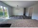 Bright dining area with stylish lighting and wood floors, adjacent to the kitchen area at 2678 Stardust Trl, Decatur, GA 30034