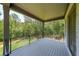Enjoy the outdoors from this covered patio with views of the lush green landscape at 2843 N North Bogan Rd, Buford, GA 30519