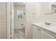 Bright bathroom with white tile, a vanity, and a tiled floor at 3314 Glenco Dr, Decatur, GA 30032