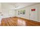 Bright living room with hardwood floors and natural light from large windows at 3314 Glenco Dr, Decatur, GA 30032