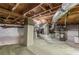 Well-maintained crawlspace with vapor barrier, ductwork, and structural supports at 4723 N Springs Nw Rd, Kennesaw, GA 30144