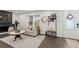 Cozy living room featuring hardwood floors, a fireplace, and stylish decor at 4723 N Springs Nw Rd, Kennesaw, GA 30144