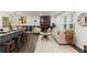 Open-concept space with stylish decor, fireplace, and seating, perfect for entertaining at 4723 N Springs Nw Rd, Kennesaw, GA 30144