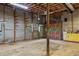Spacious unfinished basement with exposed ceiling and vintage cabinets at 3441 Sherrod Sw Dr, Marietta, GA 30060