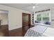 Bright bedroom featuring a window seat, built-in shelving, and double door closet at 3441 Sherrod Sw Dr, Marietta, GA 30060