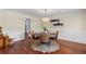 Elegant dining room with hardwood floors, a chandelier, wainscoting, and a round table with stylish seating at 3441 Sherrod Sw Dr, Marietta, GA 30060