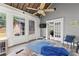 Relaxing sunroom with vaulted wood ceiling, ceiling fan, and multiple windows offering great light at 3441 Sherrod Sw Dr, Marietta, GA 30060