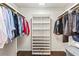 This walk-in closet features shelving and hanging racks at 3441 Sherrod Sw Dr, Marietta, GA 30060