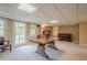 Finished basement area with large table at 435 Chantenay Pl, Alpharetta, GA 30022