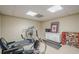 Spacious basement area with gym equipment and decor at 435 Chantenay Pl, Alpharetta, GA 30022