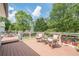 Outdoor deck showing wicker chairs, dining table, and outdoor furniture for relaxation and entertaining at 435 Chantenay Pl, Alpharetta, GA 30022
