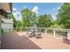 Outdoor deck features a dining table and chairs, providing ample space for outdoor entertaining and relaxation at 435 Chantenay Pl, Alpharetta, GA 30022