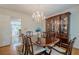 Formal dining room featuring a large table, hutch, and chandelier at 435 Chantenay Pl, Alpharetta, GA 30022