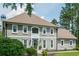 Elegant two-story home with a beautifully landscaped yard, neutral siding, and classic design at 435 Chantenay Pl, Alpharetta, GA 30022