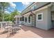 Rear of the house shows a large deck, exterior windows, and a screened-in porch for outdoor enjoyment at 435 Chantenay Pl, Alpharetta, GA 30022